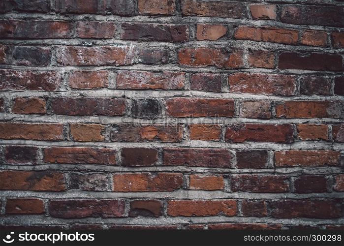 Giant tiled, industrial red brick wall background in Vilnius, Lithuania. May be used in design and interiors.