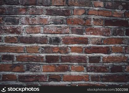 Giant tiled, industrial red brick wall background in Vilnius, Lithuania. May be used in design and interiors.