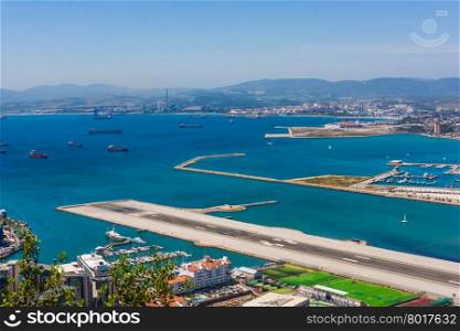 Gibraltar city and airport runway and La Linea de la Concepcion in Spain
