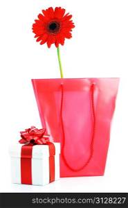 gift and red flower close up