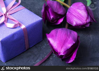 gift and tulip. Box with a gift and a bouquet of tulips. Valentine Day