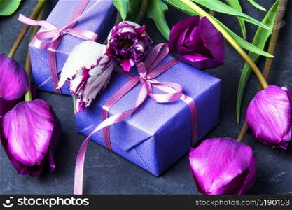 gift and tulip. Box with a gift and a bouquet of tulips. Valentine Day