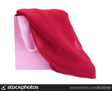 gift bag with red scarf isolated on white background