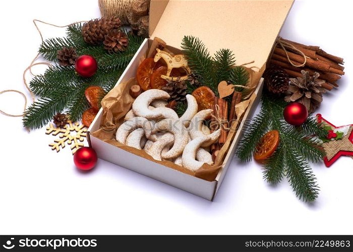 Gift box full of Traditional German or Austrian Vanillekipferl vanilla kipferl cookies. High quality photo. Gift box full of Traditional German or Austrian Vanillekipferl vanilla kipferl cookies