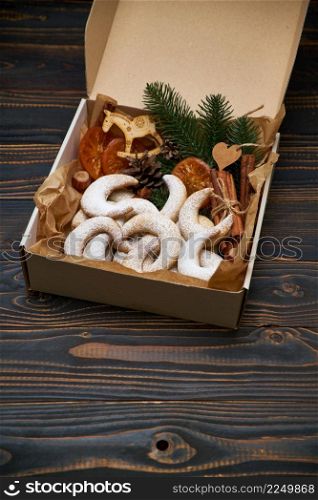 Gift box full of Traditional German or Austrian Vanillekipferl vanilla kipferl cookies. High quality photo. Gift box full of Traditional German or Austrian Vanillekipferl vanilla kipferl cookies