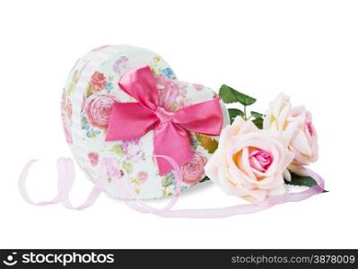 Gift box in the shape of heart, ribbon and roses on a white background