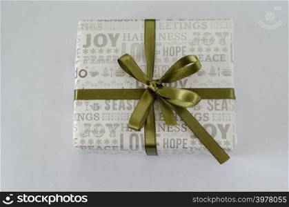 Gift box with green ribbon and bow on white background,isolated,