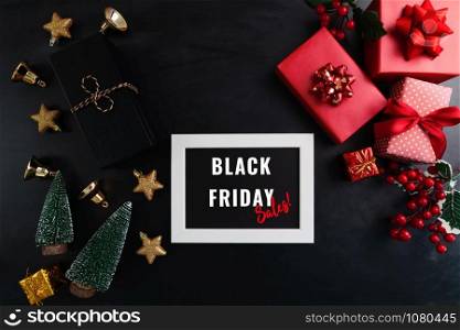 gift box with photo frame for Black Friday Sale concept on black background