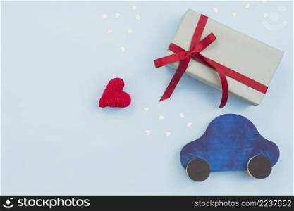 gift box with toy car red heart