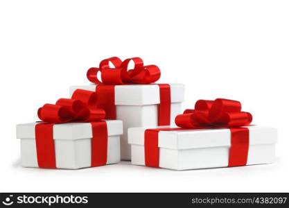 Gift boxes with red bow isolated on white background