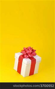 gift close up isolated on yellow background