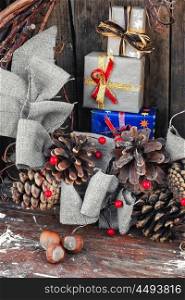 Gift for christmas. Christmas wreath and a box with gifts for the winter holidays