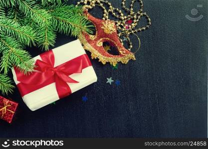 gift with red ribbon on a table
