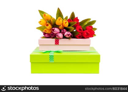 Giftbox and tulips isolated on white