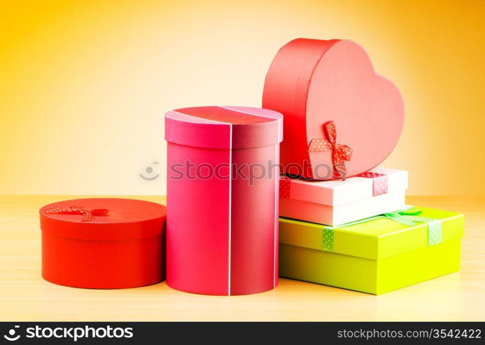 Giftboxes against gradient background