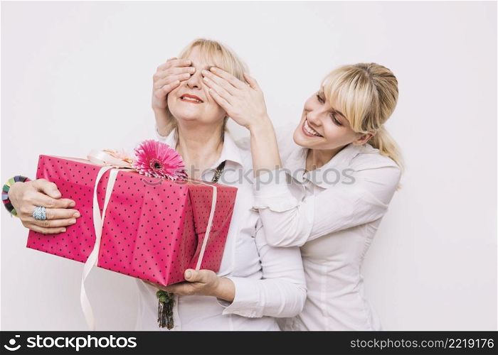 gifting concept with daughter mother