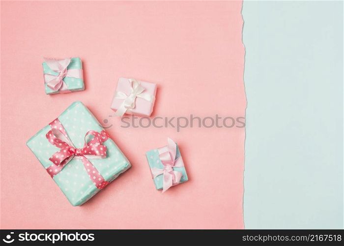 gifts decorated with ribbons arranged dual color surface