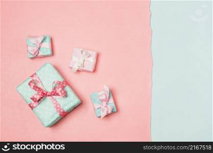 gifts decorated with ribbons arranged dual color surface