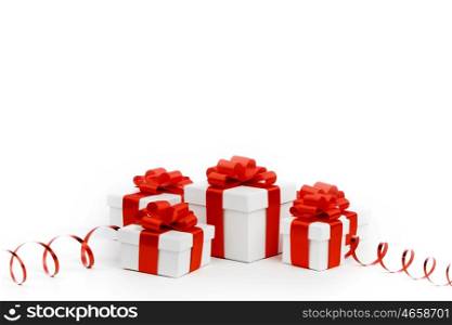 Gifts in white boxes with curly red ribbons isolated on white background