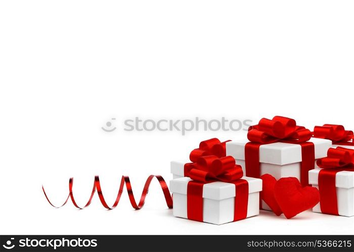 Gifts with heart decoration isolated on white background