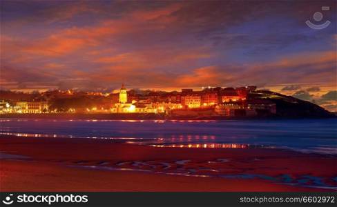 Gijon skyline sunset in San Lorenzo beach of Asturias in Spain