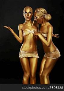 Gilt. Coloring. Two Funny Women with Paintbrush. Golden Makeup