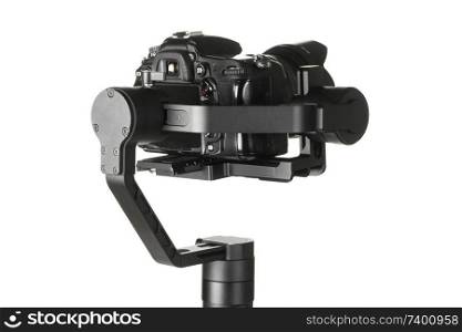 Gimbal three-axis motorized stabilizer with mounted DSLR camera isolated on white background. Gimbal stabilizer with camera