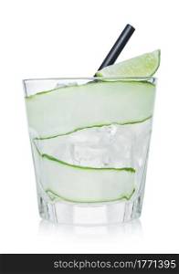 Gimlet cocktail in glass with ice cubes and straw, cucumber and lime slice on white background.