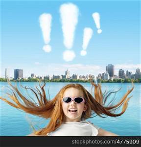 Ginger child with exclamation marks above