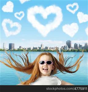 Ginger girl and heart-shaped clloudlets