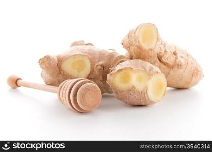 Ginger root and drizzler isolated on white background.