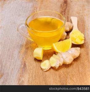 Ginger tea on wooden table