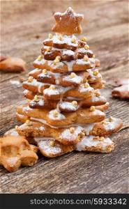 gingerbread christmas tree. Baked gingerbread christmas tree on wooden table