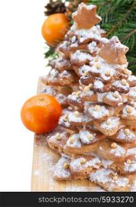gingerbread christmas tree. two gingerbread christmas tree with tangerines isolated on white background
