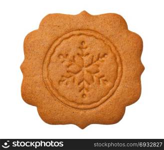 Gingerbread cookie in shape of label with snowflake isolated on white background. Top view