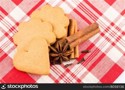 Gingerbread cookies on fabric napkin background. Christmas decoration