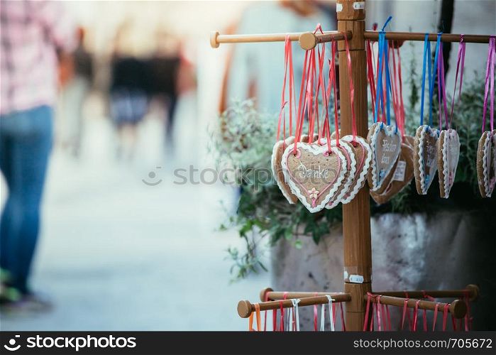 Gingerbread heart with Danke in a pedestrian area, Austria