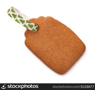 Gingerbread label cookie with ribbon isolated on white background. Top view. Gingerbread Label Cookie with Ribbon Isolated on White Backgroun
