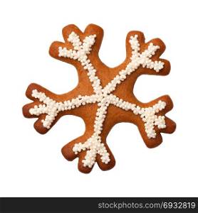 Gingerbread snowflake cookie isolated on white background. Top view