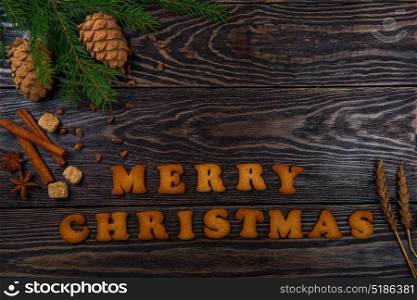 Gingerbreads for christmas on wooden background. Gingerbreads for new years and christmas