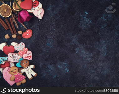 Gingerbreads for love or marrige. Gingerbreads for love or marrige on dark concrete background
