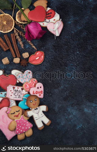 Gingerbreads for love or marrige. Gingerbreads for love or marrige on dark concrete background