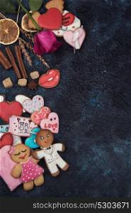 Gingerbreads for love or marrige. Gingerbreads for love or marrige on dark concrete background