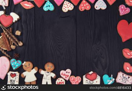 Gingerbreads for Valentines Day. Gingerbreads for Valentines Day on dark concrete background