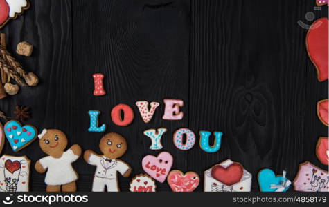 Gingerbreads for Valentines Day. Gingerbreads for Valentines Day on dark concrete background