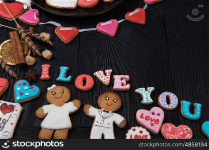 Gingerbreads for Valentines Day. Gingerbreads for Valentines Day on dark concrete background