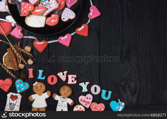 Gingerbreads for Valentines Day. Gingerbreads for Valentines Day on dark concrete background