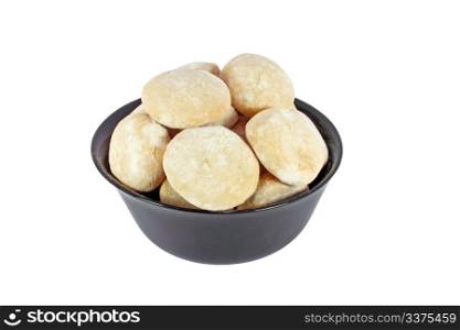 Gingerbreads in black bowl isolated on white