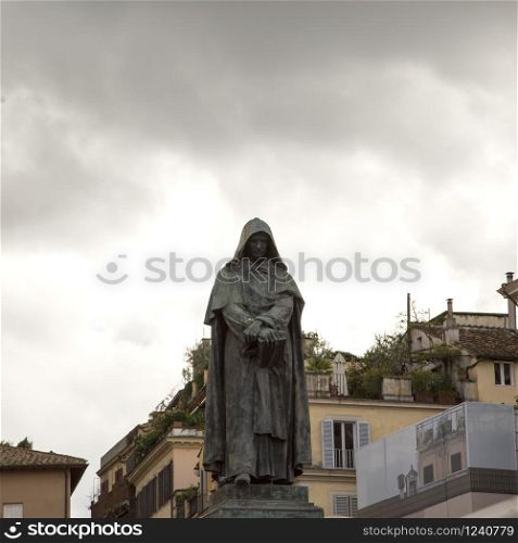 Giordano Bruno statue in Campo de&rsquo; Fiori, Rome, under gray sky, square image