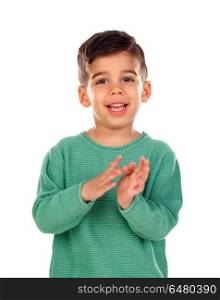 Gipsy child with green t-shirt clapping. Gipsy child with green t-shirt clapping isolated on a white background